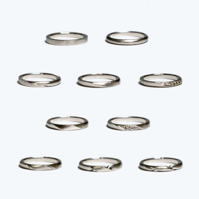 甲丸デザインに、カットや宝石でアクセントを加えた結婚指輪