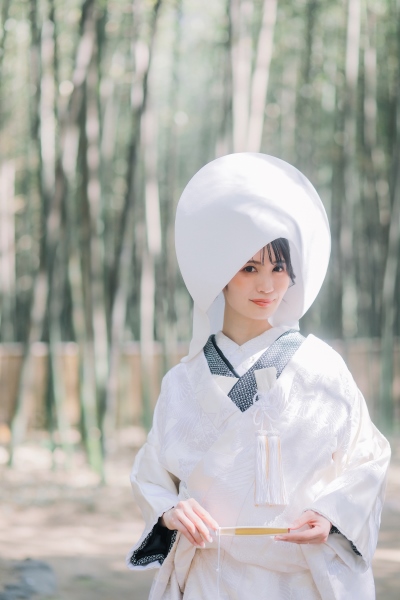 スタジオゼロ京都本店のロケーション撮影で、綿帽子を身に着ける新婦