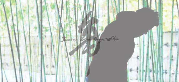竹林と礼をする「JAPANESE BRUSH DESIGN WORKS Kaku」代表で書家の角谷さん