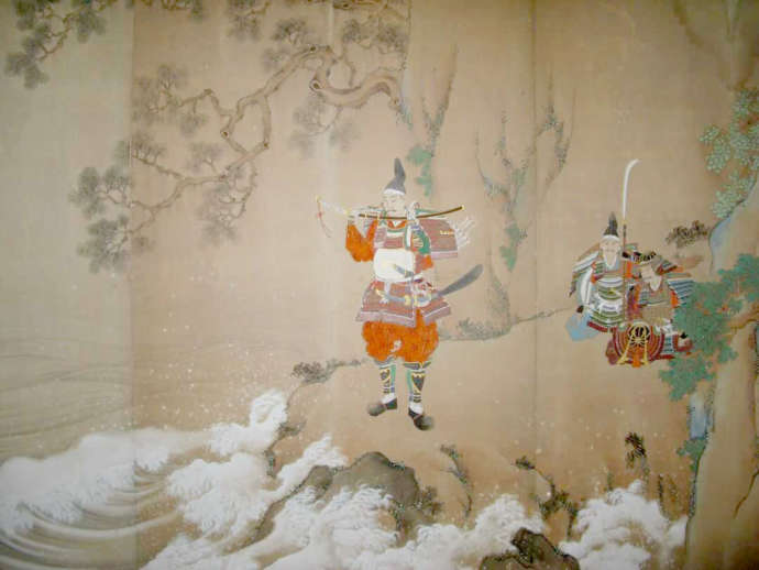 新田義貞が海に刀を投げ入れて祈ったとされるシーンを描いた絵画